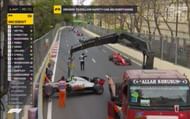 Romain Grosjean's car being cleared at the 2018 Baku GP